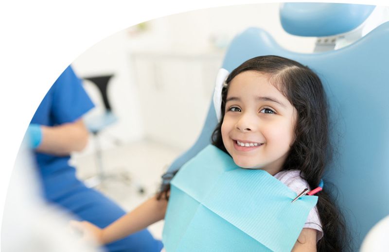 Smiling little girl in dental office